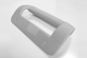A foam model of one of the first variants of the entry-level door handle.