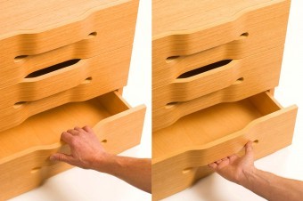 The handle can be accessed from above and below making it a very universal design without the typical stigma.